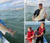 A man is smiling and holding up a large fish he caught while on a boat in the sea