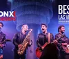 The image shows the band The Bronx Wanderers performing energetically on stage with a Best of Las Vegas 2021 award logo displayed above them