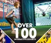 The image is a promotional collage showcasing different people enjoying interactive exhibits with a large text in the center announcing OVER 100 INTERACTIVE EXHIBITS