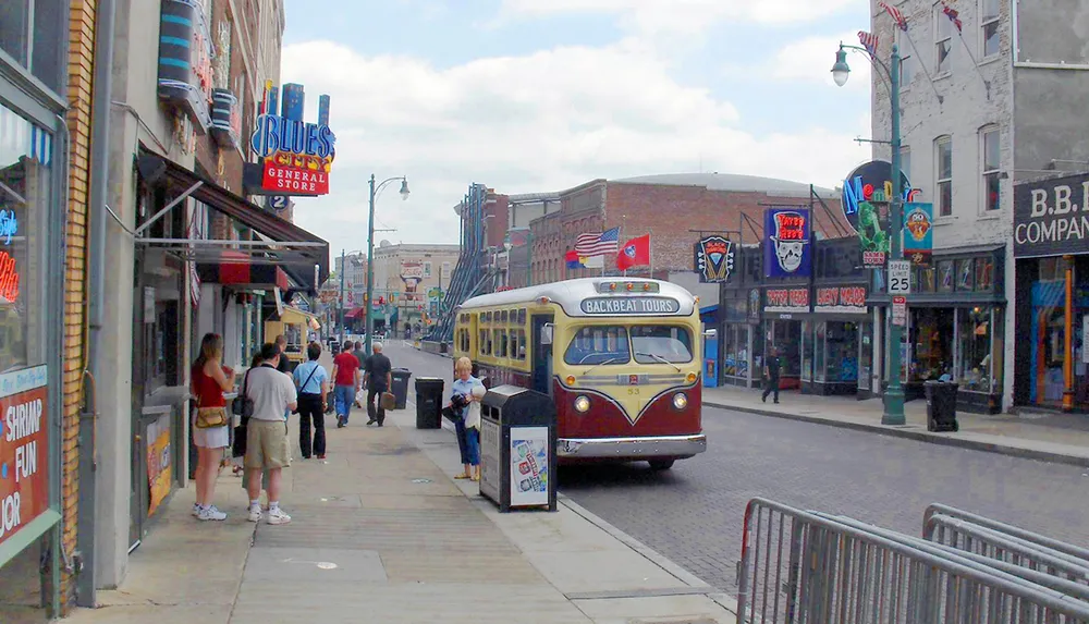 A vintage-style bus tours down a vibrant street adorned with neon signs and pedestrians evoking a lively retro urban atmosphere